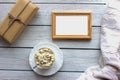 Zero waste eco gift bag. Wooden frame for text. Hygge coffee mockup