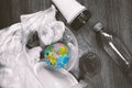 Zero waste, environmental pollution. A photo of Plastic disposable garbage and a globe in the plastic bag with garbage. Save the Royalty Free Stock Photo