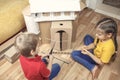 Zero waste home activity. Kids doing paper house with cardboard box, creatively thinking concept