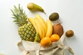 Zero waste and plastic free concept. Grocery shopping with eco bag over white background. Flat lay, top view. Copy space Royalty Free Stock Photo