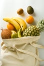 Zero waste and plastic free concept. Grocery shopping with eco bag over white background. Flat lay, top view. Copy space Royalty Free Stock Photo