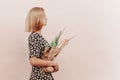 Zero waste. Portrait of Young woman in summer dress with a paper craft eco bag of vegetables and baguette. Sustainable Royalty Free Stock Photo