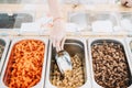 Zero waste shop. Woman buying dry goods in plastic free grocery store Royalty Free Stock Photo