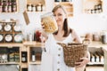 Zero waste shop. Woman buying products in plastic free grocery store Royalty Free Stock Photo