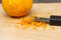 Zesting an orange Royalty Free Stock Photo