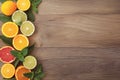 Zesty display Oranges, lemons, limes, grapefruit, and mint on wood