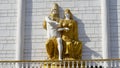 zeus and hermes statue of golden colour