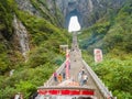 Crowd of tourist Climbing Heaven gate cave stairs on tianmen mountain national park at Zhangjiajie city china.