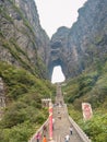 Crowd of tourist Climbing Heaven gate cave stairs on tianmen mountain national park at Zhangjiajie city china.