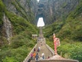 Crowd of tourist Climbing Heaven gate cave stairs on tianmen mountain national park at Zhangjiajie city china.