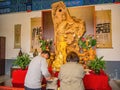 Tourist of people Praying to Goddess of Compassion or Guanyin goddess Statue in Tianmen Temple