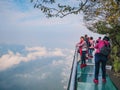 Unacquainted Tourists on Glass Cliff walk in tianmen mountain at Zhangjiajie city china Royalty Free Stock Photo
