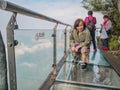 Unacquainted Tourists on Glass Cliff walk in tianmen mountain at Zhangjiajie city china.Tianmen mountain the travel destination of Royalty Free Stock Photo
