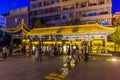 ZHANGYE, CHINA - AUGUST 22, 2018: Evening view of people on a square in Zhangye, Gansu Province, Chi