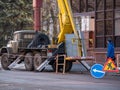 ZHITOMIR, UKRAINE - December 1, 2019: Crane truck standing on asphalt road