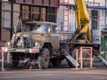 ZHITOMIR, UKRAINE - December 1, 2019: Crane truck standing on asphalt road