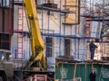 ZHITOMIR, UKRAINE - December 1, 2019: Workers at builing construction area