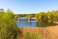 Spring view of the park Serebryany Bor in Moscow. A lake with trees on the shores in spring. Royalty Free Stock Photo