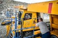 Zhodzina, Belarus - August 16, 2013: Granite mining in Quarry Trucks quarry of BelAZ producer