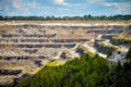 Zhodzina, Belarus - August 16, 2013: Granite mining in Quarry Trucks quarry of BelAZ producer