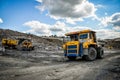 Zhodzina, Belarus - August 16, 2013: Granite mining in Quarry Trucks quarry of BelAZ producer