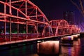 Zhongshan Bridge over the Lanzhou Yellow River illuminated by red lights at the night Royalty Free Stock Photo