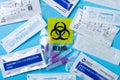 Several packs of home rapid antigen tester for coronavirus on blue