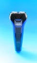 electric shaver on a blue background