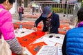 People writing Chinese new year scrolls