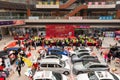 People writing Chinese new year scrolls and looking live show in a shopping mall