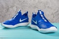 Pair of blue sporty shoes for kid