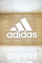 big Adidas logo in a shopping mall at vertical composition