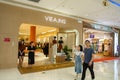 Viea.ing clothing shop in a shopping mall