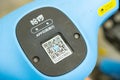 close up of the QR code of a Hellomoto shared electric scooter in the outdoor
