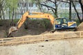 Zhukovskiy, Russia - May 02, 2017: Editorial use only. The excavator builds the road. Road construction machinery.