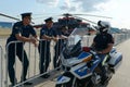 Military pilots talk to a traffic police inspector at the MAKS-2021 International Aviation and Space Salon in Zhukovsky, Russia