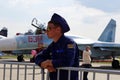 ZHUKOVSKY, RUSSIA, JUL. 2015: Aerospace aircraft exhibition MAKS 2015. Aircraft pilot in navy uniform and brown sun glasses at jet Royalty Free Stock Photo