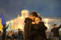 Zhytomyr, Ukraine - February 20, 2022: Couple dancing at ukrainian flag