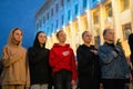 Zhytomyr, Ukraine - February 20, 2022: five young girls put hands on the hearts