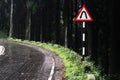 hairpin bend and slippery accident prone mountain road during monsoon (rainy season) Royalty Free Stock Photo