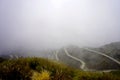 THE ZIG ZAG ROAD COVERED WITH CLOUD IN SILK ROUTE SIKKIM Royalty Free Stock Photo