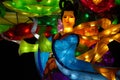 The Zigong Lantern Festival in Zigong, Sichuan, China. Lantern representing an apsara with flower.