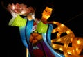The Zigong Lantern Festival in Zigong, Sichuan, China. Lantern representing an apsara with flower.