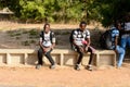 Unidentified Senegalese boys sit on the fence.