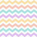 Zigzag pattern in pastel purple, green, orange, yellow, white. Seamless colorful chevron vector graphic background for gift paper. Royalty Free Stock Photo