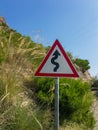 Zigzag road warning sign board Royalty Free Stock Photo