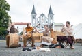 Zilina, Slovak RepubliÃÂ, Slovakia - July 28, 2023: Four participants street band playing folk music during traditional annual