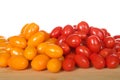 Zima, an orange grape tomatoes next to Angel Sweet grape Tomatoes Royalty Free Stock Photo