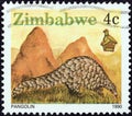 ZIMBABWE - CIRCA 1990: A stamp printed in Zimbabwe shows a pangolin, circa 1990.