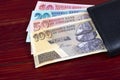 Zimbabwean money in the black wallet Royalty Free Stock Photo